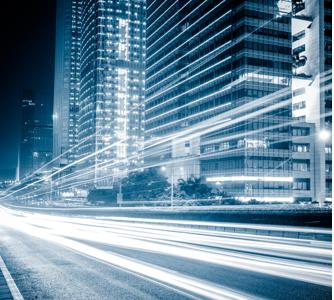 the light trails on the modern building background in shanghai china. the light trails on the modern building background in shanghai china.